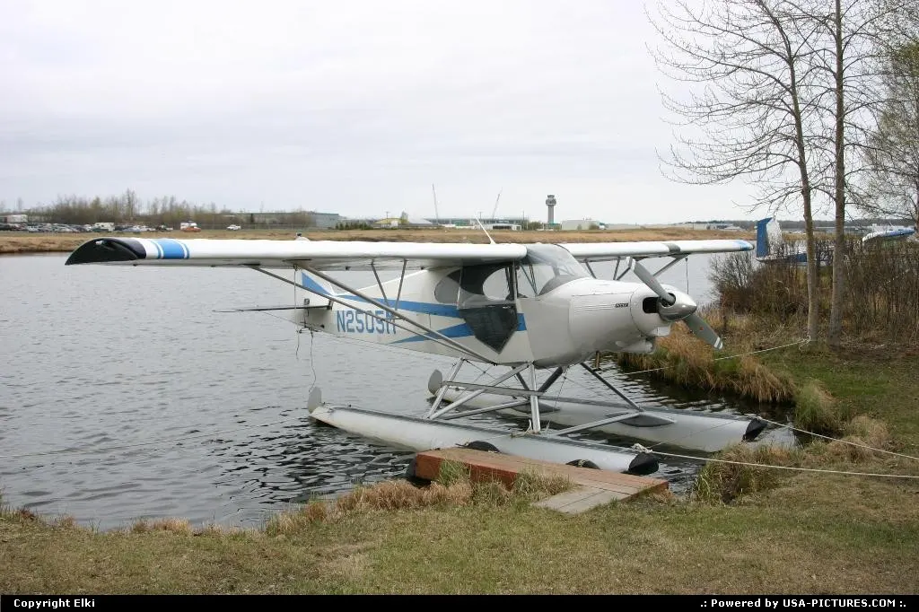 Seaplane at Lake Hood. Spot ANC's ATC tower in the background.