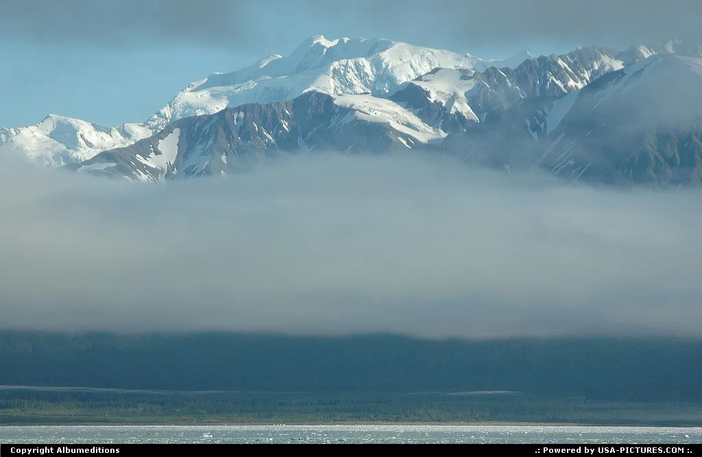 The cloud-obscured coastline of Yakutat Bay.