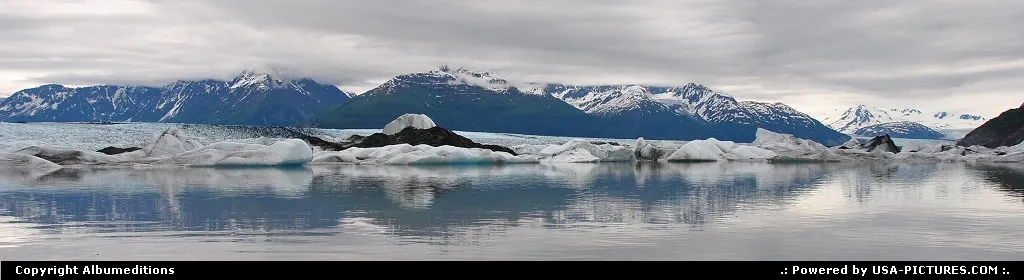 Knik Glacier (left), Colony Glacier and Lake George Glacier (right) creeps through the...