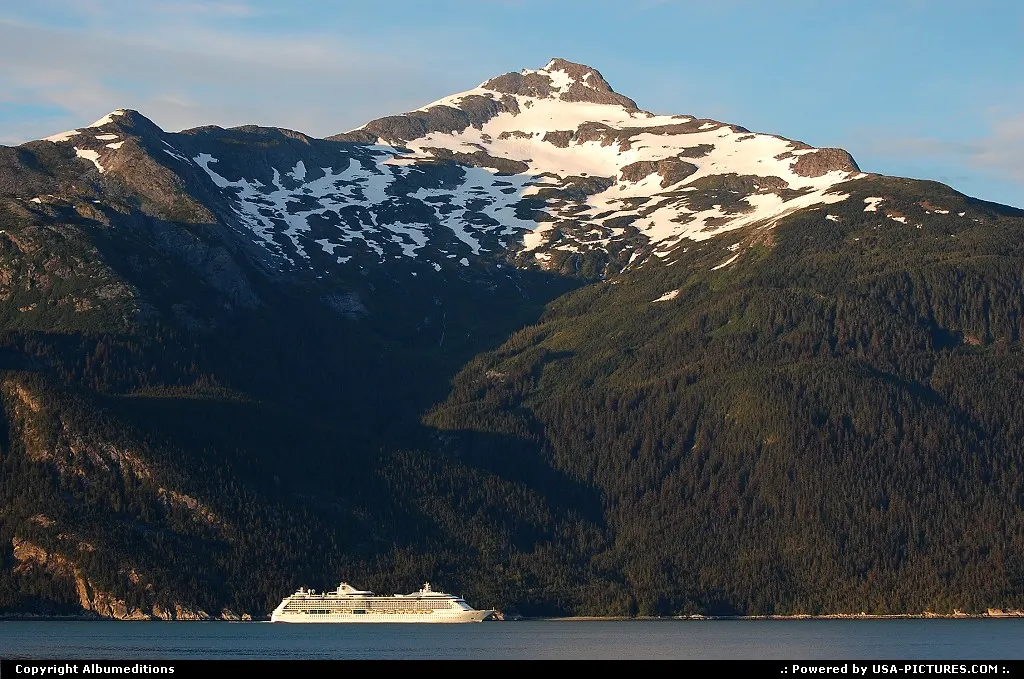 During summer cruiseships are passing the scenic coastline of Tongass National Forest.