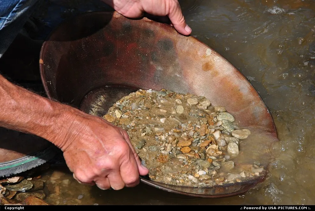 In the river valleys of interior Alaska and the Klondike, gold panning is still very po...