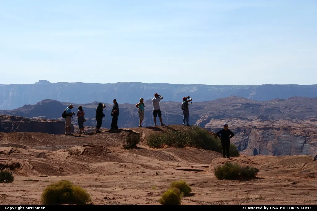 Tourists enjoying the view at Horseshoe Bend.