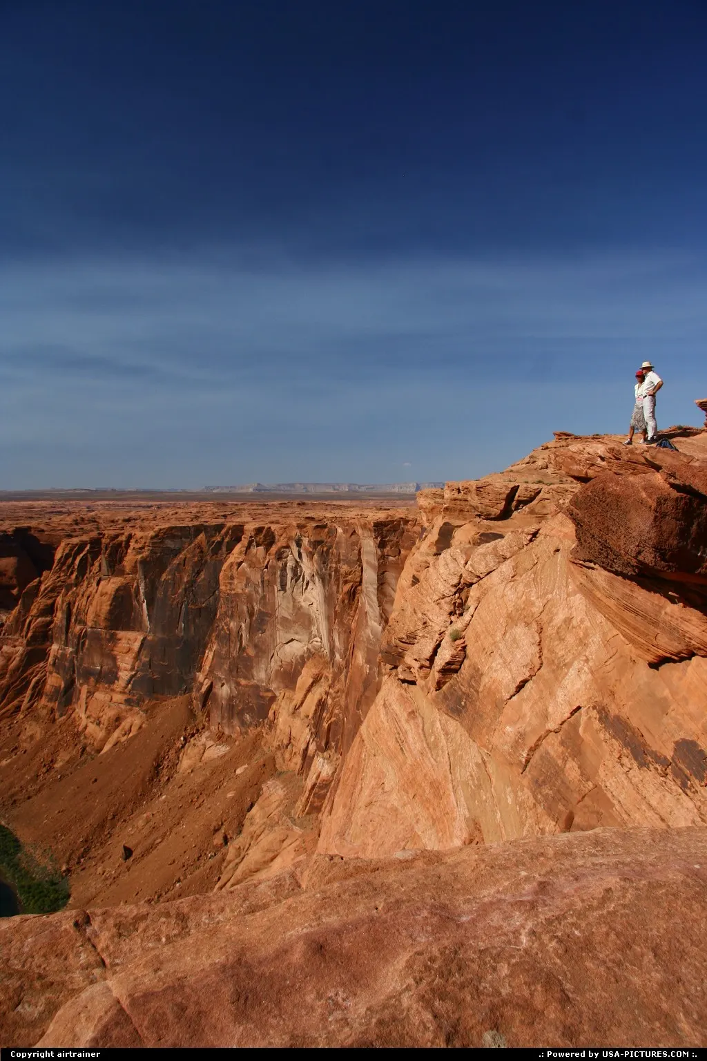 Tourists enjoying the amazing view on the Colorado at Horseshoe Bend.
