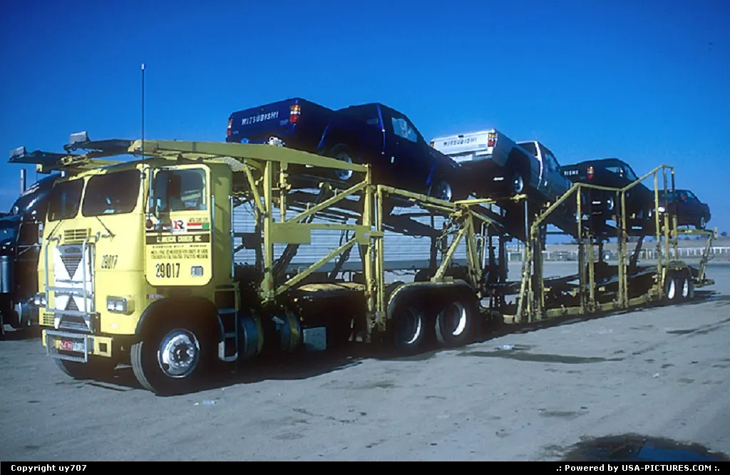 Illustrated by a Peterbuilt tractor pulling a quintessentially North American trailer f...
