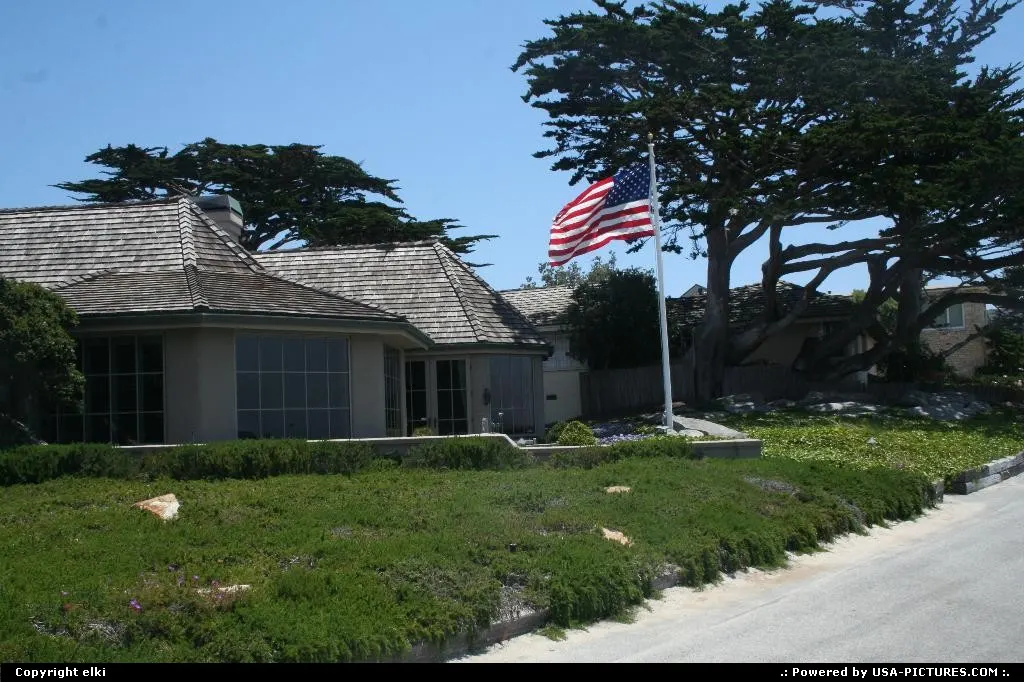 Carmel house. As usually in USA, a us flag is proudly present in the garden.