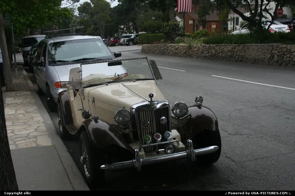 Lovely old car, in the lovely city of carmel.