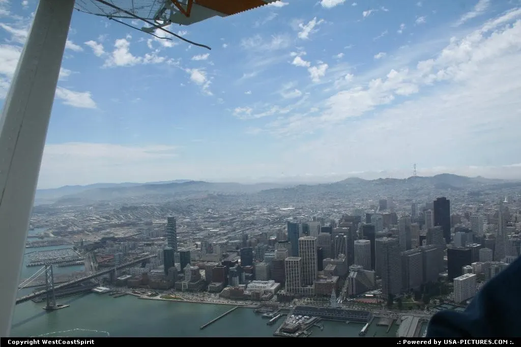 Downtown San Francisco from above on this fogy day; Twin Peaks after (look for the ante...
