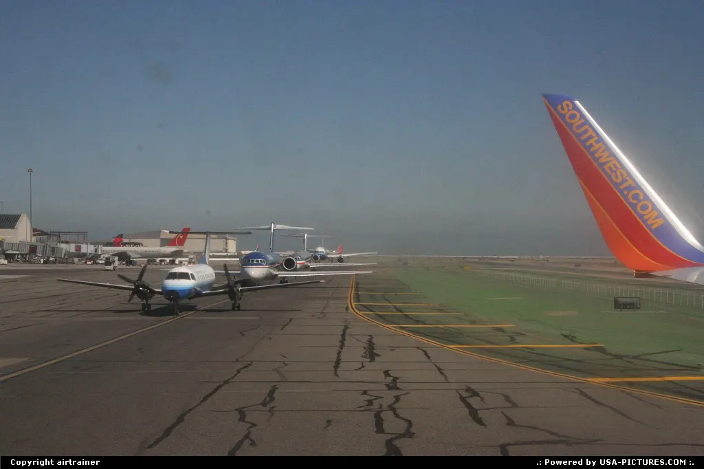 Busy departure at SFO international airport. Sorry for the dirty window :)