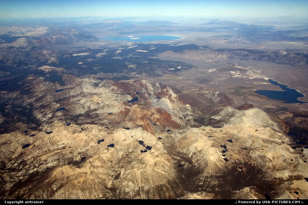 Flying over the mountains near Yosemite NP, Mono Lake can be seen in the background.