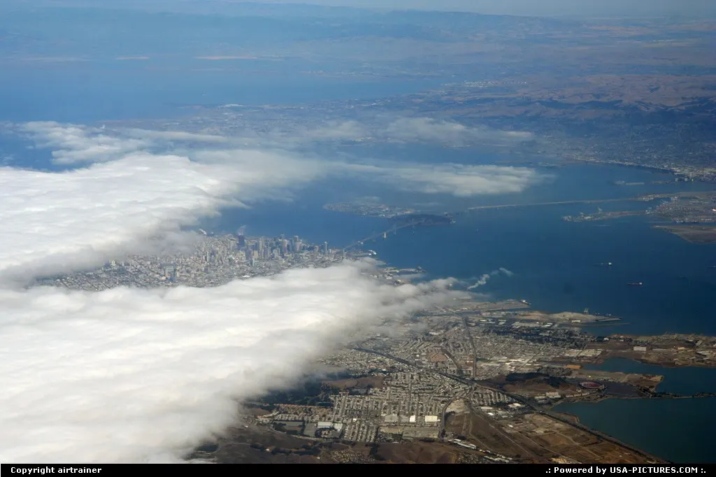 Downtown San Francisco viewed from a Southwest 737, the Bay Bridge can be seen in the m...