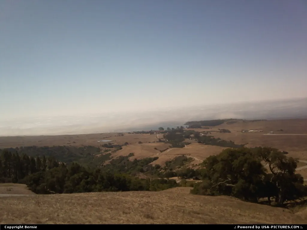 The fog still covers the ocean as seen from Hearst Castle hill