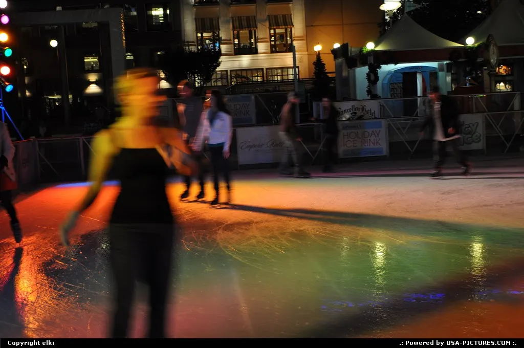 ice rink, at san francisco during christmas time, kind of wife beater shirt, wear by th...