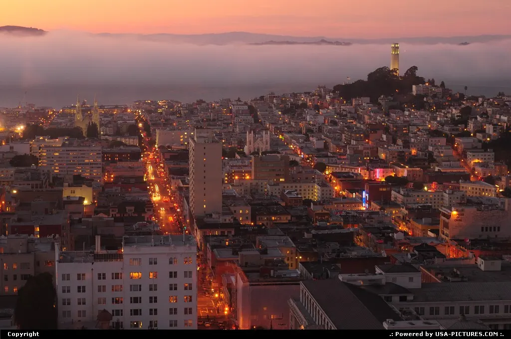 Sunset on San Francisco while the fog is coming in through the bay and next, over the c...