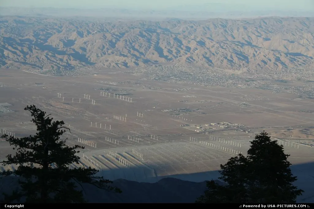Bird view over the desert and the wind mills complex by Palm Springs city boundaries.