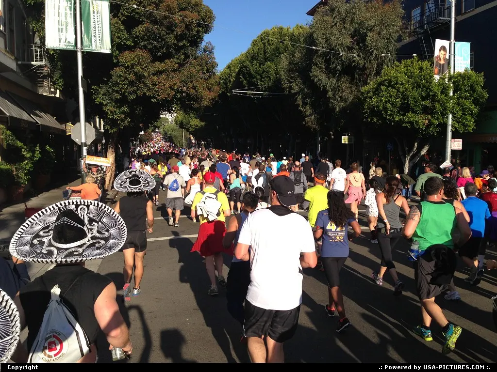The crowd ready to challenge the infamous slope on Hayes street, after mile 2, during t...