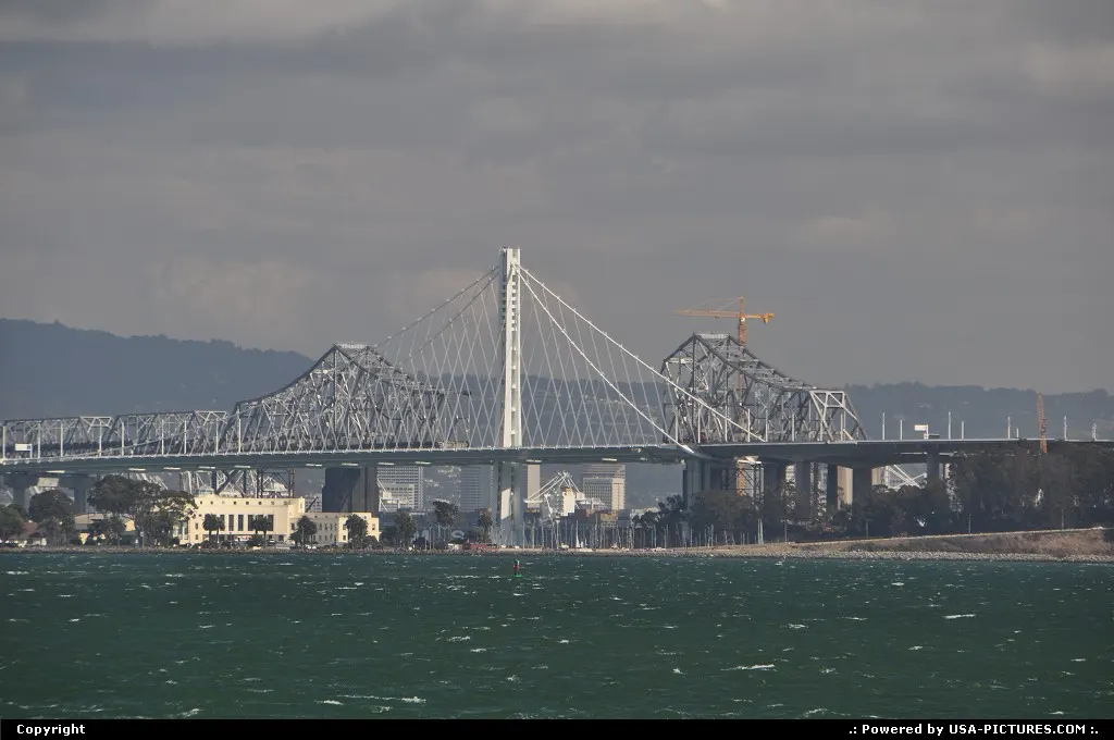Taking bay bridge old east span down, one beam at a time