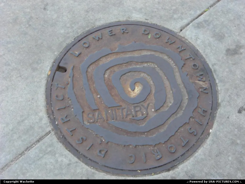 an original manhole cover in denver