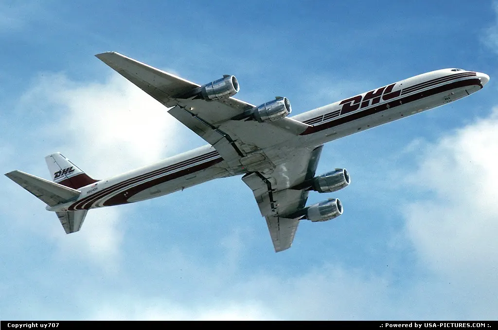 A DHL Douglas DC.8-73CF soaring to cruise level from Miami.