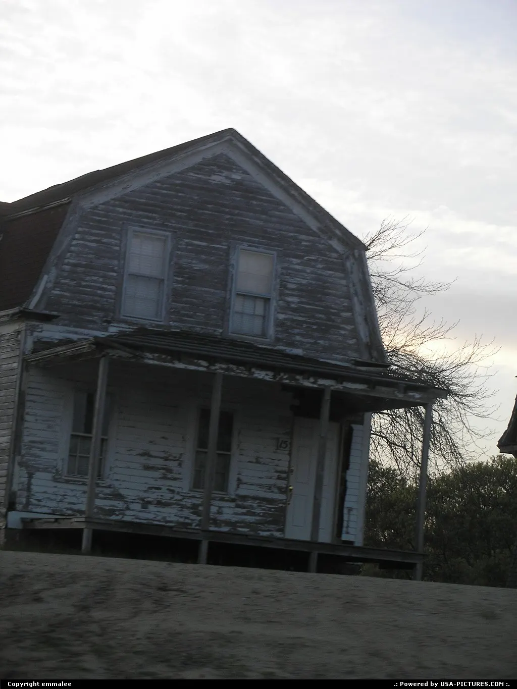 Winter closing in on an abanded house.
