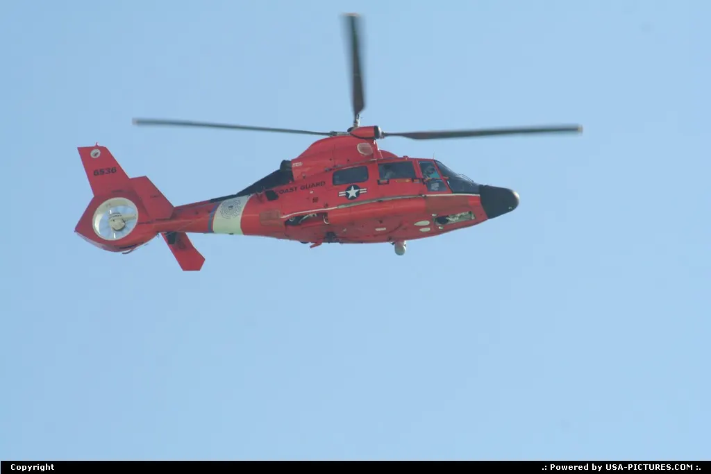 helicopter flying over miami beach