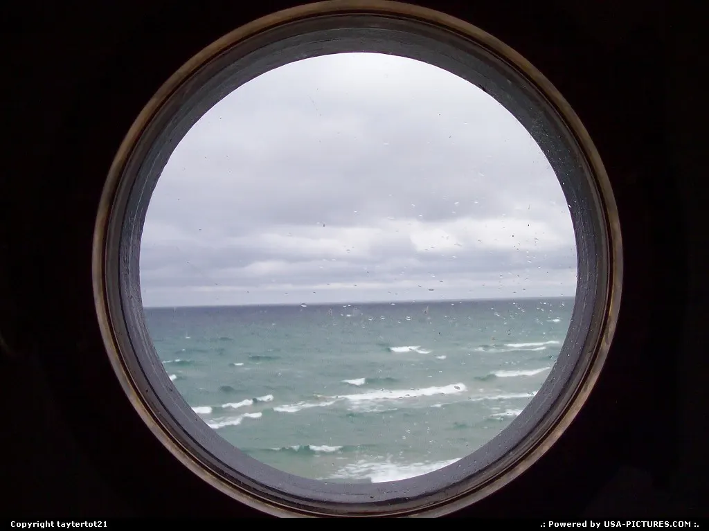 Looking through a window, in the Big Sable lighthouse, out to Lake Michigan