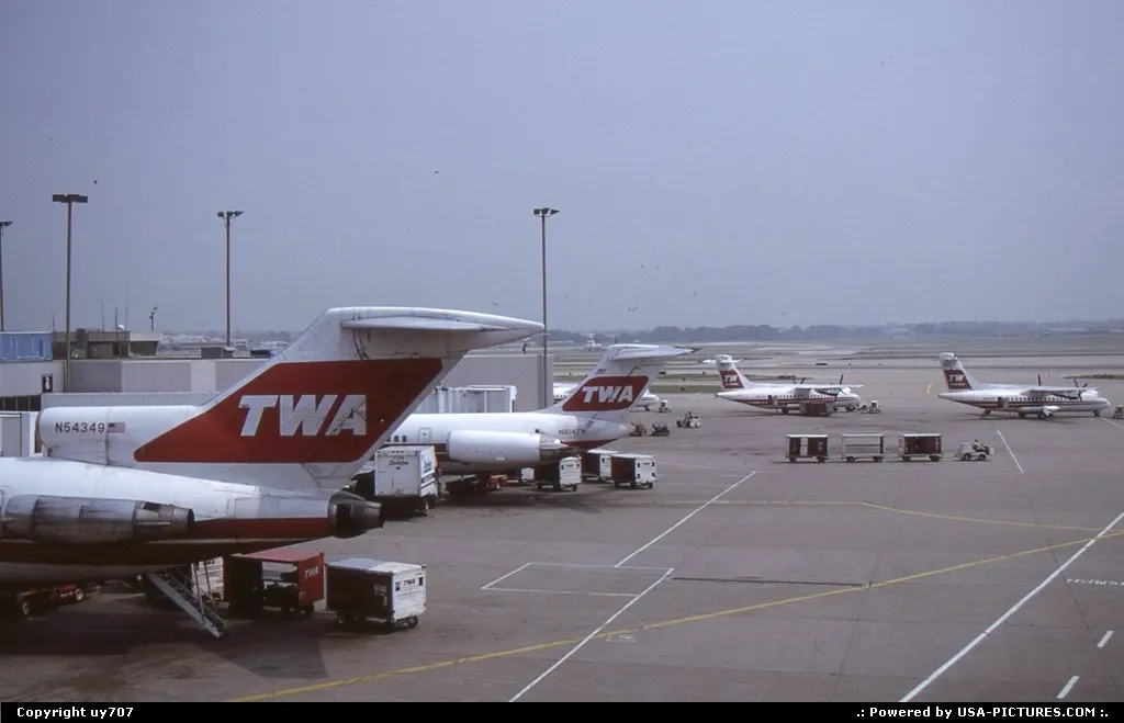 Still then Lambert's major resident airline, TWA was still showing up with the livery d...