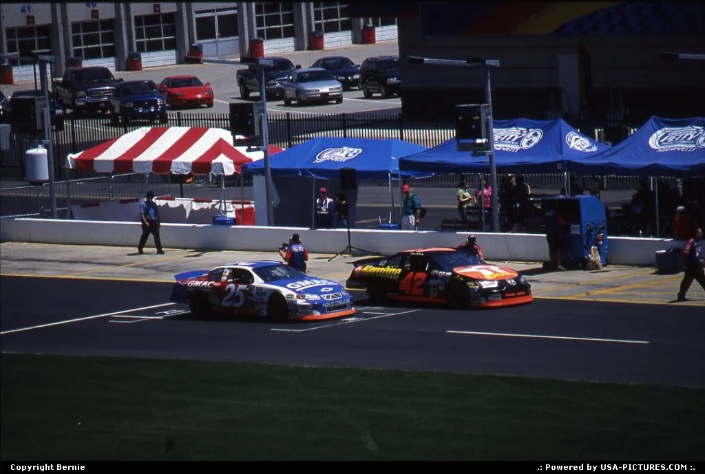 NASCAR drivers Brian Vickers #25 Chevrolet and Casey Mears #42 Dodge in the pits of Low...