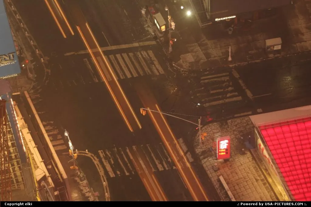 Some early lights of taxi in times square on sunday morning
