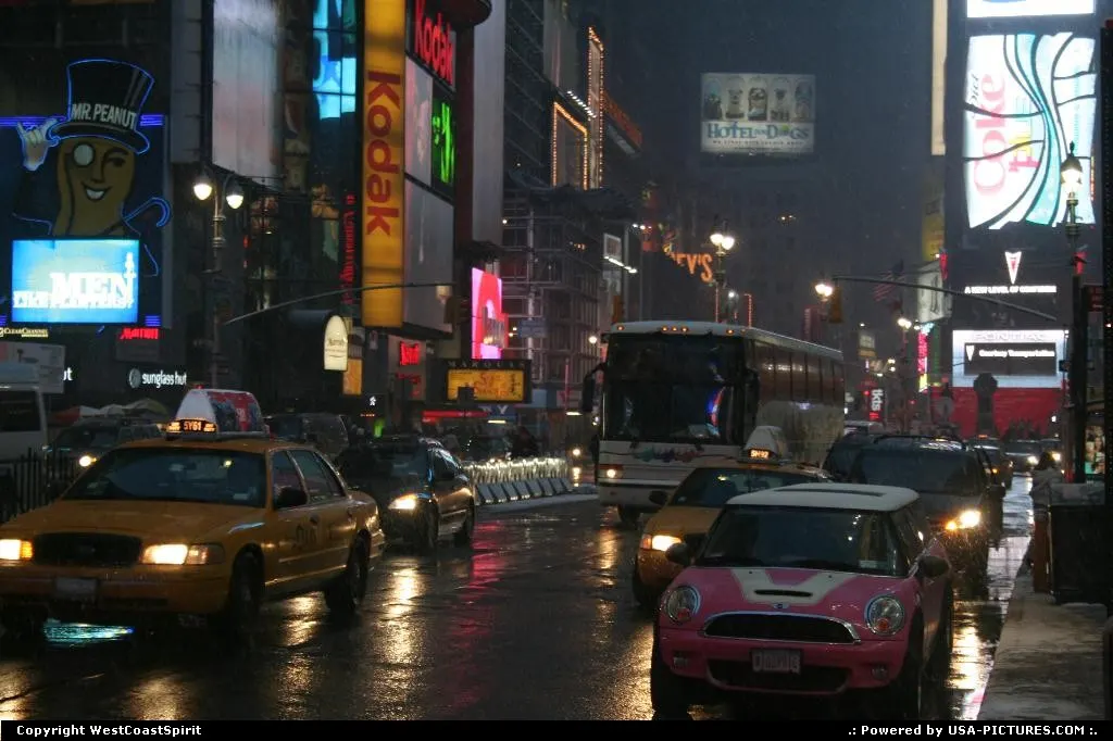 Vibrant Times Square, by night and under the snow.