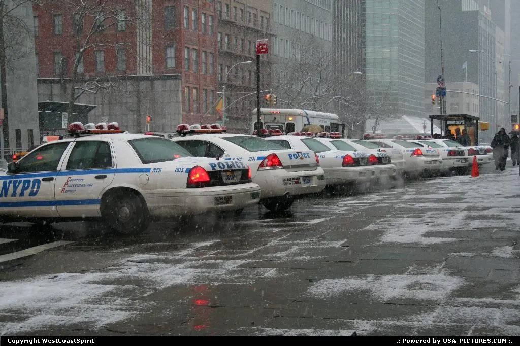 Quite a few policemen to protect United Nation front gate.