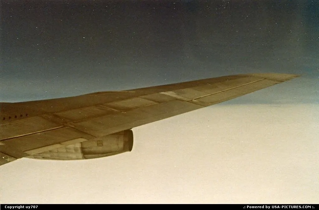 Cruise level somewhere between Kennedy Airport and San Francisco on board a TWA Boeing...