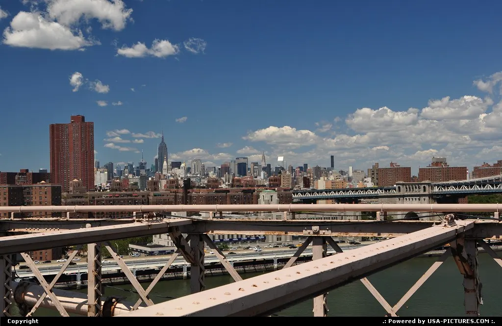 Great Manhatthan overview from Brooklyn bridge with the world famous Empire State Build...
