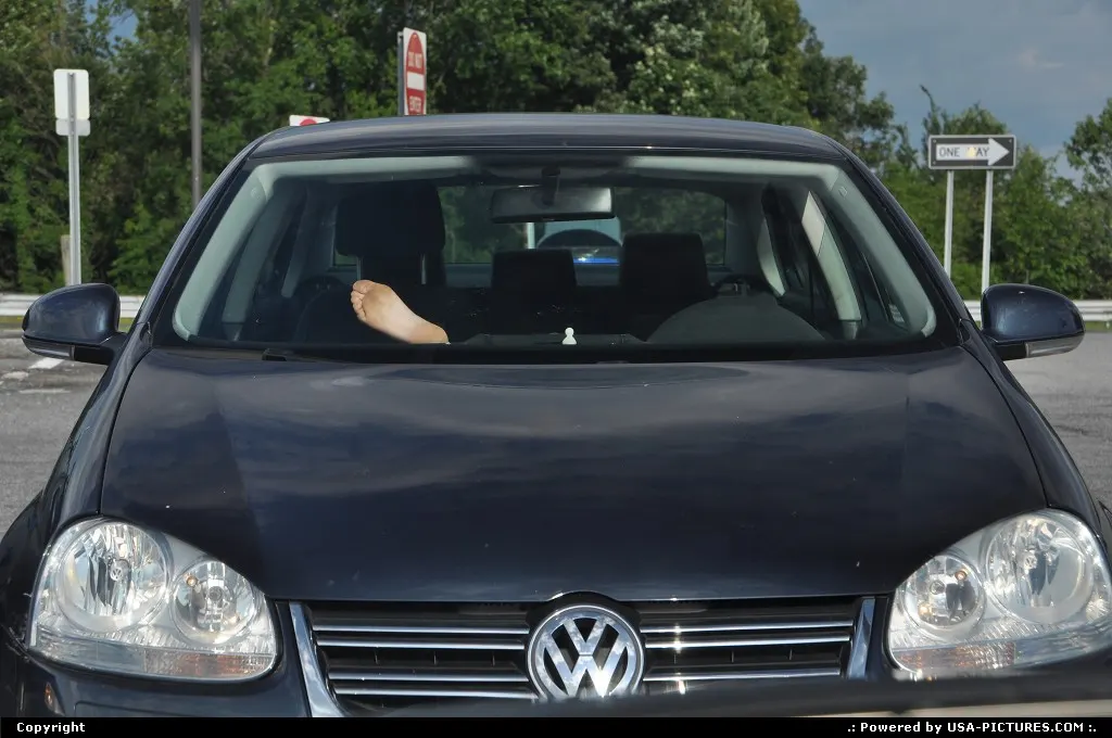No need to engage CSI or NYPD ... Someone is just napping in the parking lot.
