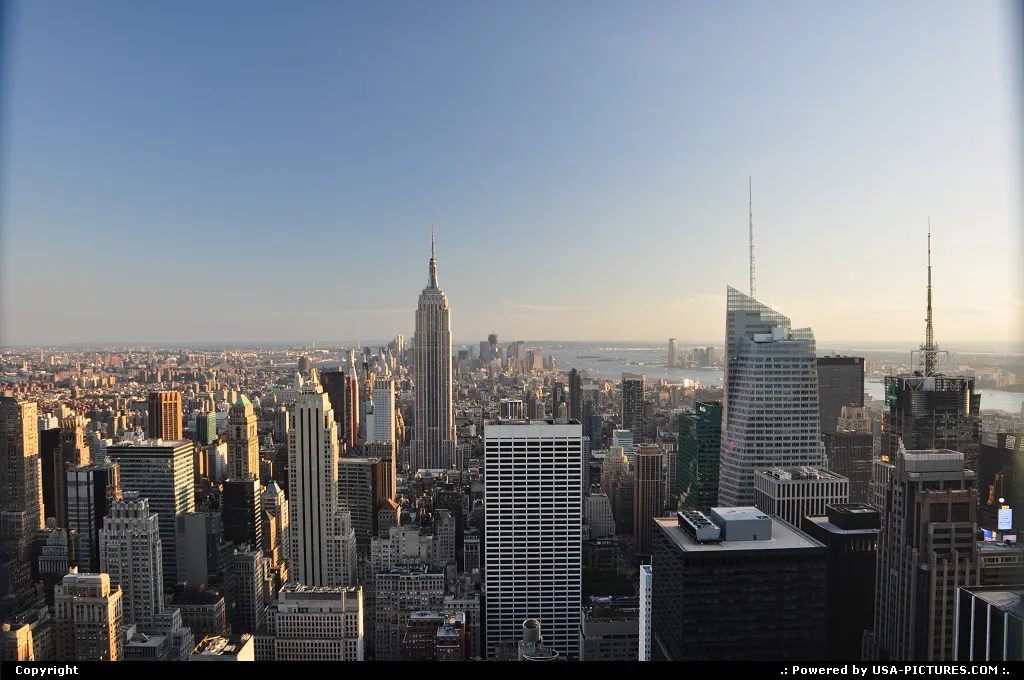 Empire State Building and lower Manhatahn, afar, minutes before sunset.