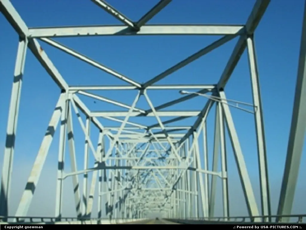 Crossing the Carl D. Perkins bridge over the Ohio River into a foggy mist.