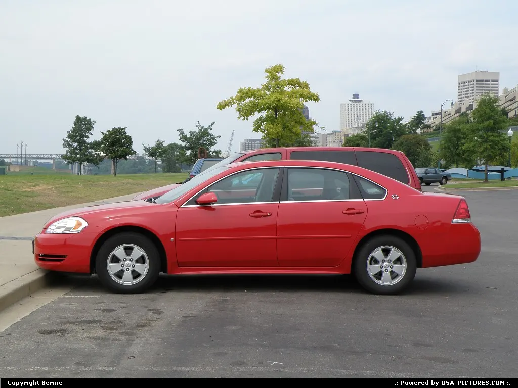 A Ferrari red Chevrolet Impala for my ride in Memphis