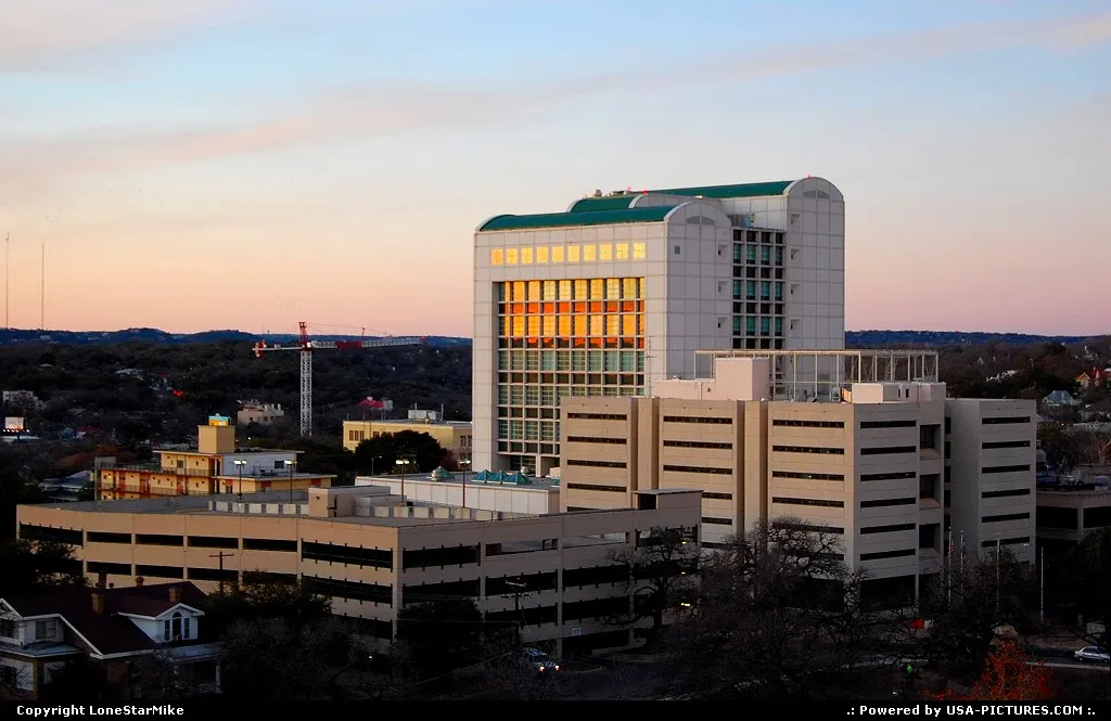 The Travis County Jail at sunset as seen from the top deck of the Chase Bank garage