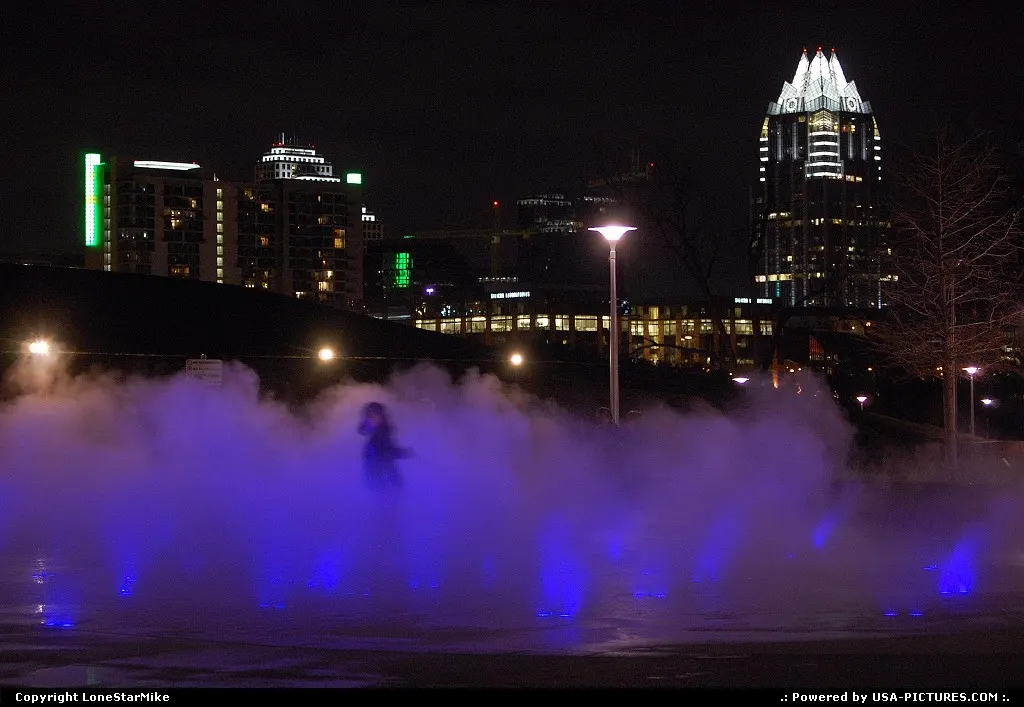 Fountains at Butler Park with skyline in distance