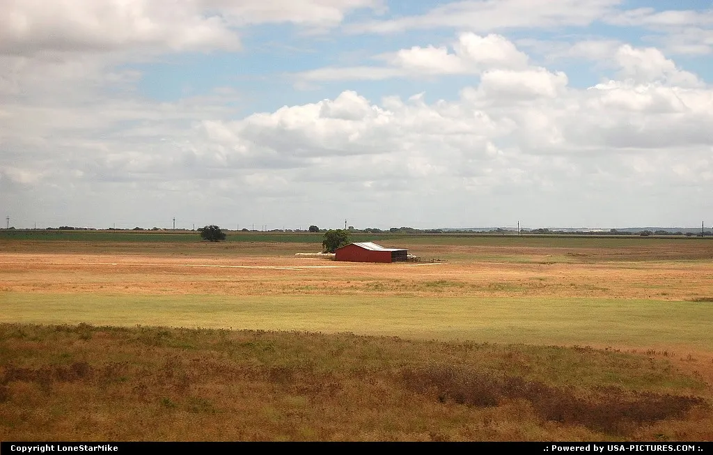 Rural scene from somewhere in Central Texas. Photographed from Amtrak's Texas Eagle.