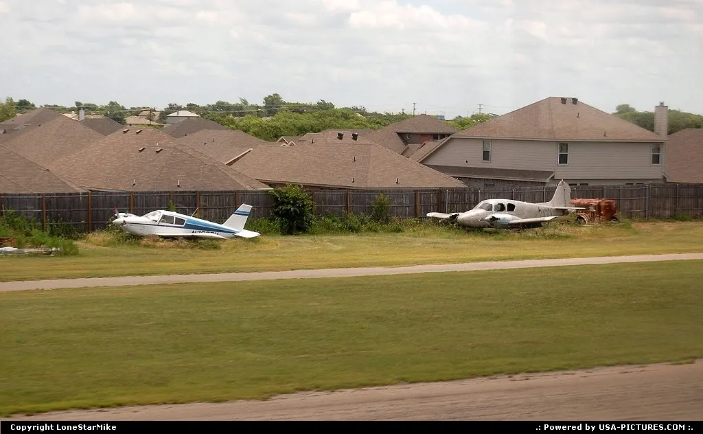 Planes & homes surround Sycamore Airport just south of Fort Worth.
