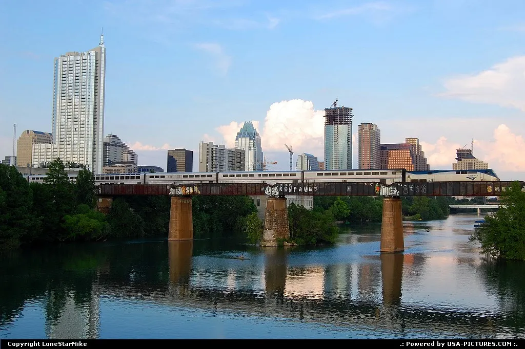 View from the Lamar Pedestrian Bridge of Amtrak's Texas Eagle crossing Lady Bird Lake o...