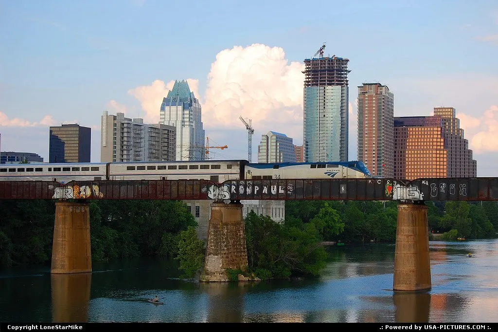 View from the Lamar Pedestrian Bridge of Amtrak's Texas Eagle crossing Lady Bird Lake o...