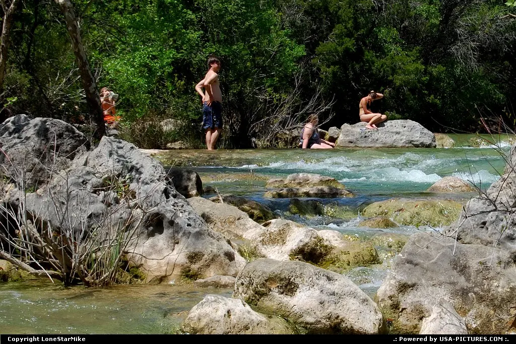 Swimmers at Twin Falls along the Barton Creek Greenbelt