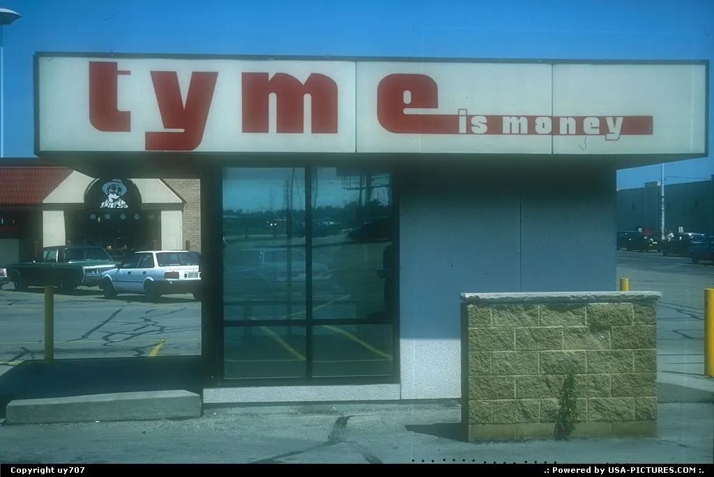 One of TYME/Take-Your-Money-Everywhere's numerous ATMs dotting Wisconsin's urban landsc...