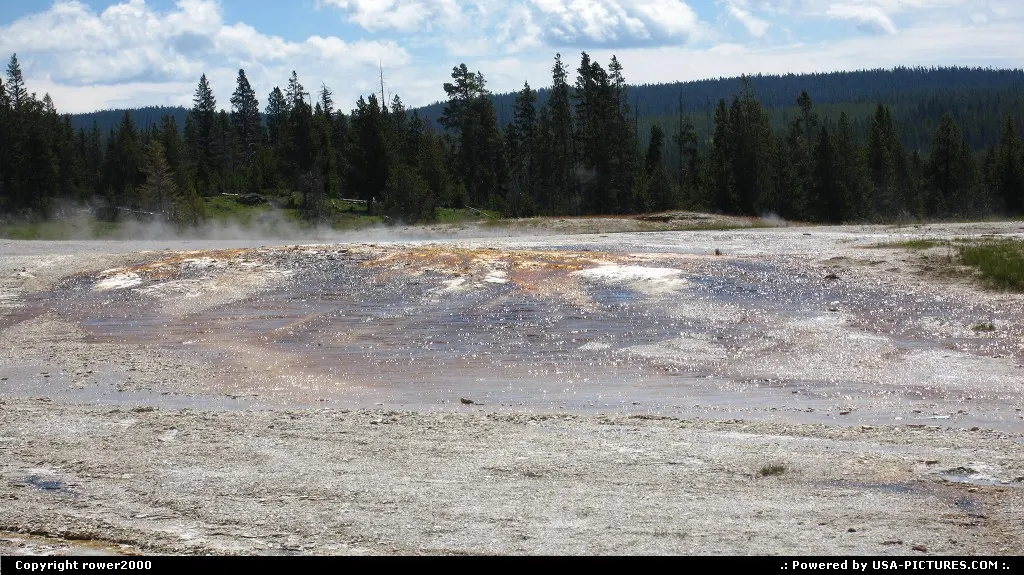 Vapor rises from Upper Geyser Basin.