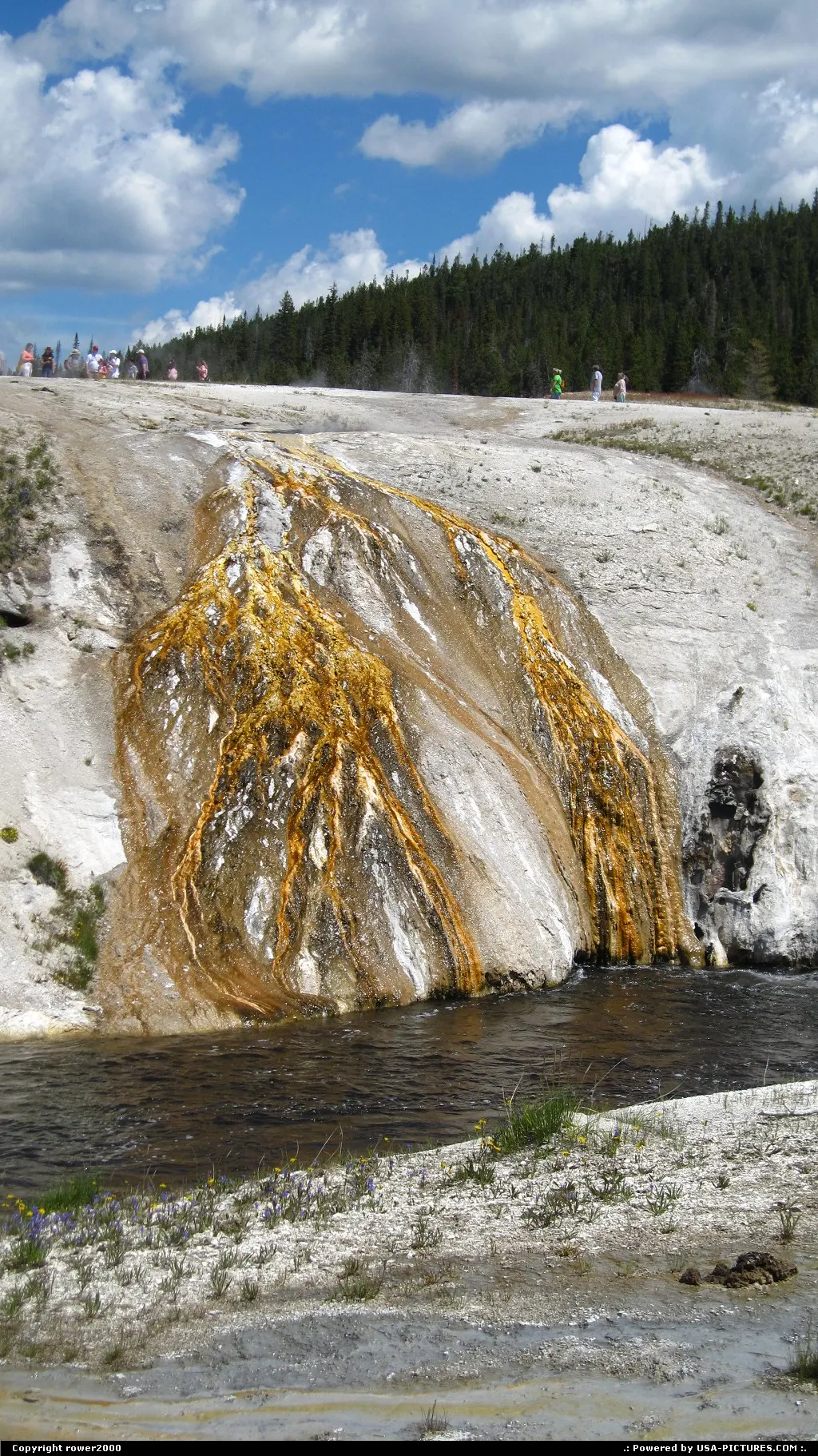 Old Faithful's waters flow into Firehole River.